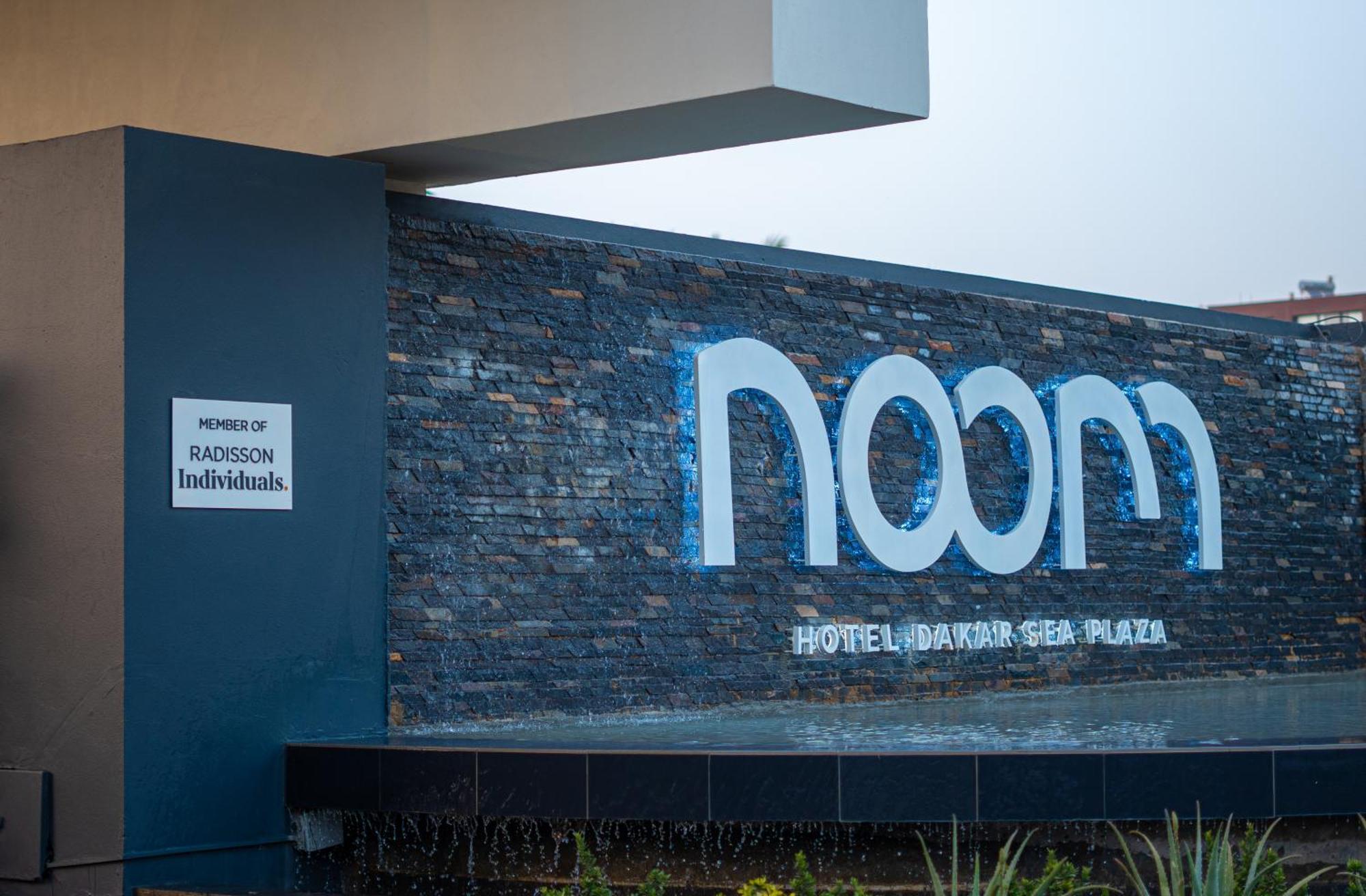 Noom Hotel Dakar Sea Plaza, A Member Of Radisson Individuals Eksteriør bilde The hotel's logo
